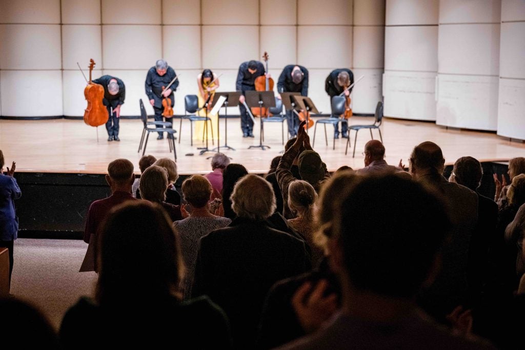 Four Seasons musicians take a bow at the conclusion of a Signature Series concert in Greenville.