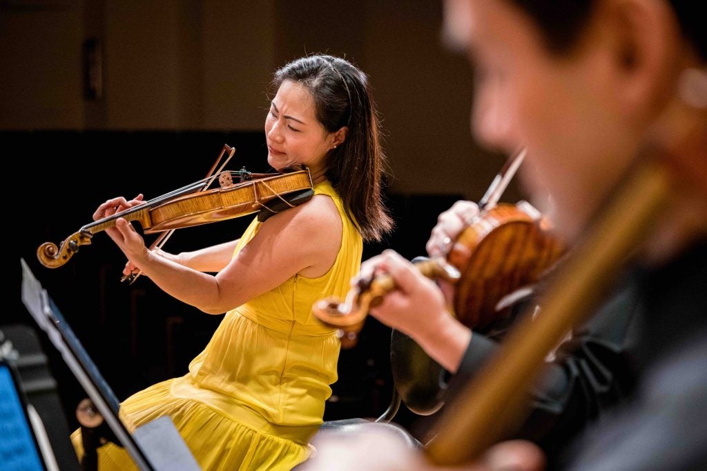 Violinist Hye-Jin Kim performs during a Signature Series concert in Greenville.