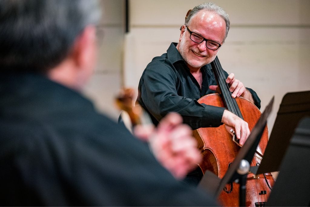 Cellist Zvi Plesser during a moment of levity ahead of a Signature Series concert in Greenville.